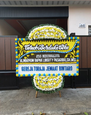 Papan Bunga Duka di Ranomuut